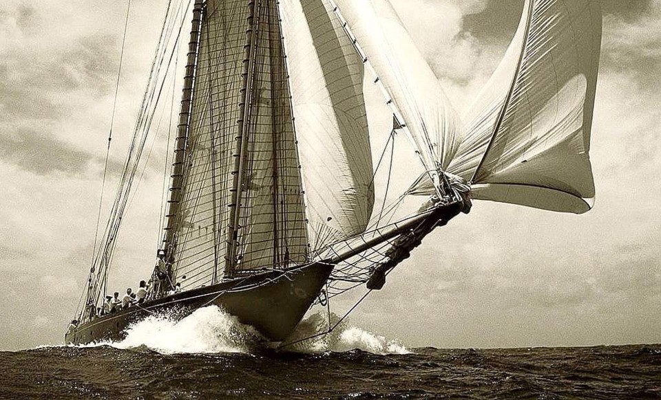 Cargo ship under way on open water, holding its course